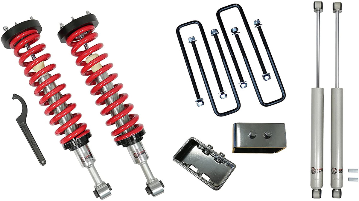 04-13 Ford F-150 Freedom Off-Road 1-4 Inch Adjustable Coilovers 3 Inch Rear Blocks with U Bolts and Shocks